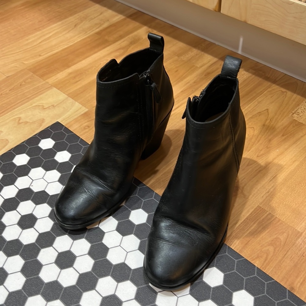 Black leather Cole Haan heeled boots